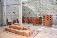 Worofila-In-Practice-earth-blocks-construction-senegal-architectural-review4-185x123.jpg
